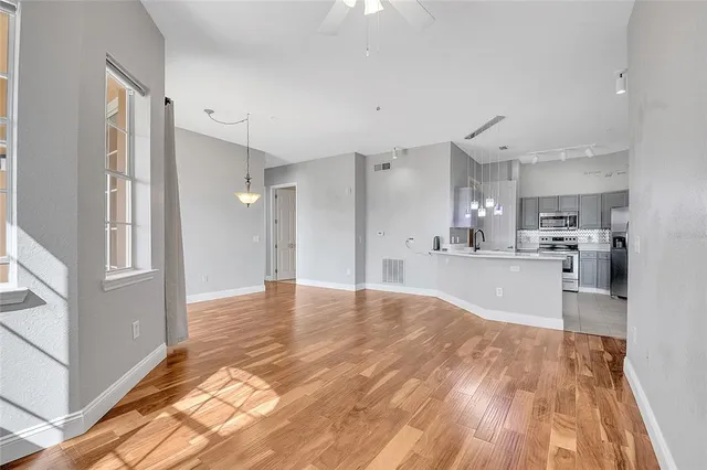 a view of kitchen with wooden floor