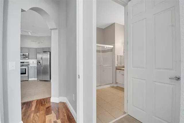 a view of a kitchen from the hallway