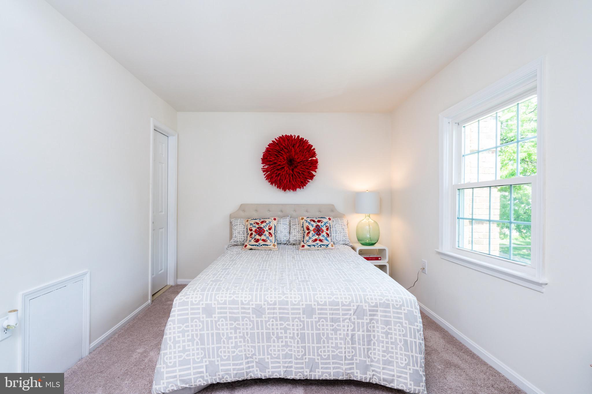 6490 Franconia Road Springfield, VA 22150 - Photo 13 of 34 a bedroom with a bed and window