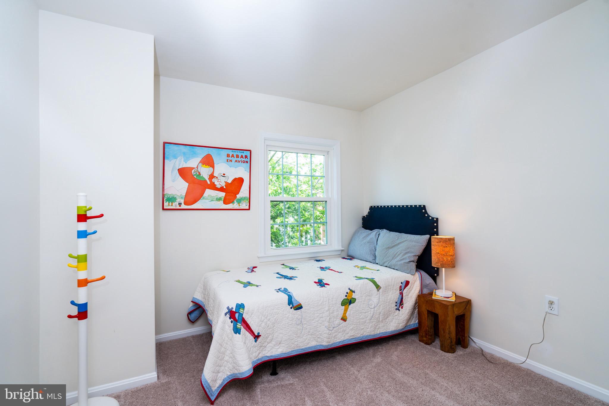 6490 Franconia Road Springfield, VA 22150 - Photo 17 of 34 a bedroom with a bed and window