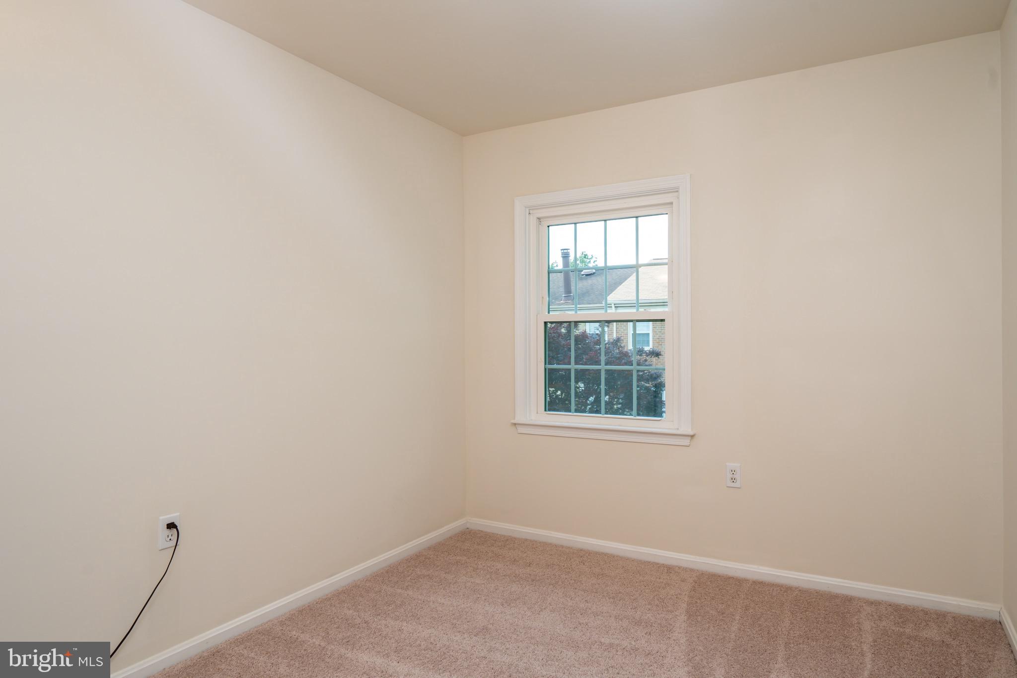 6490 Franconia Road Springfield, VA 22150 - Photo 19 of 34 an empty room with a window