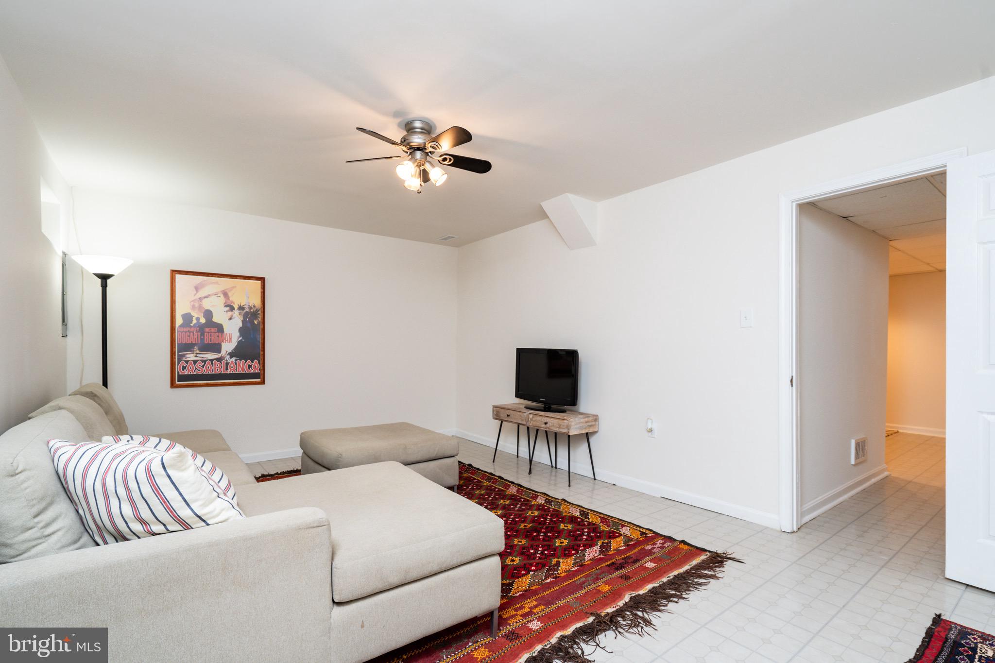 6490 Franconia Road Springfield, VA 22150 - Photo 26 of 34 a living room with furniture and a rug