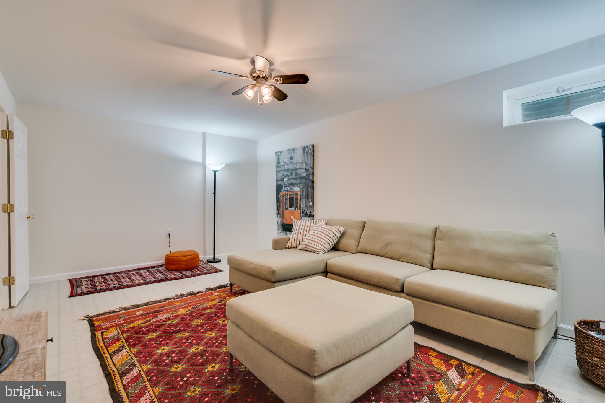 6490 Franconia Road Springfield, VA 22150 - Photo 27 of 34 a living room with furniture and a rug