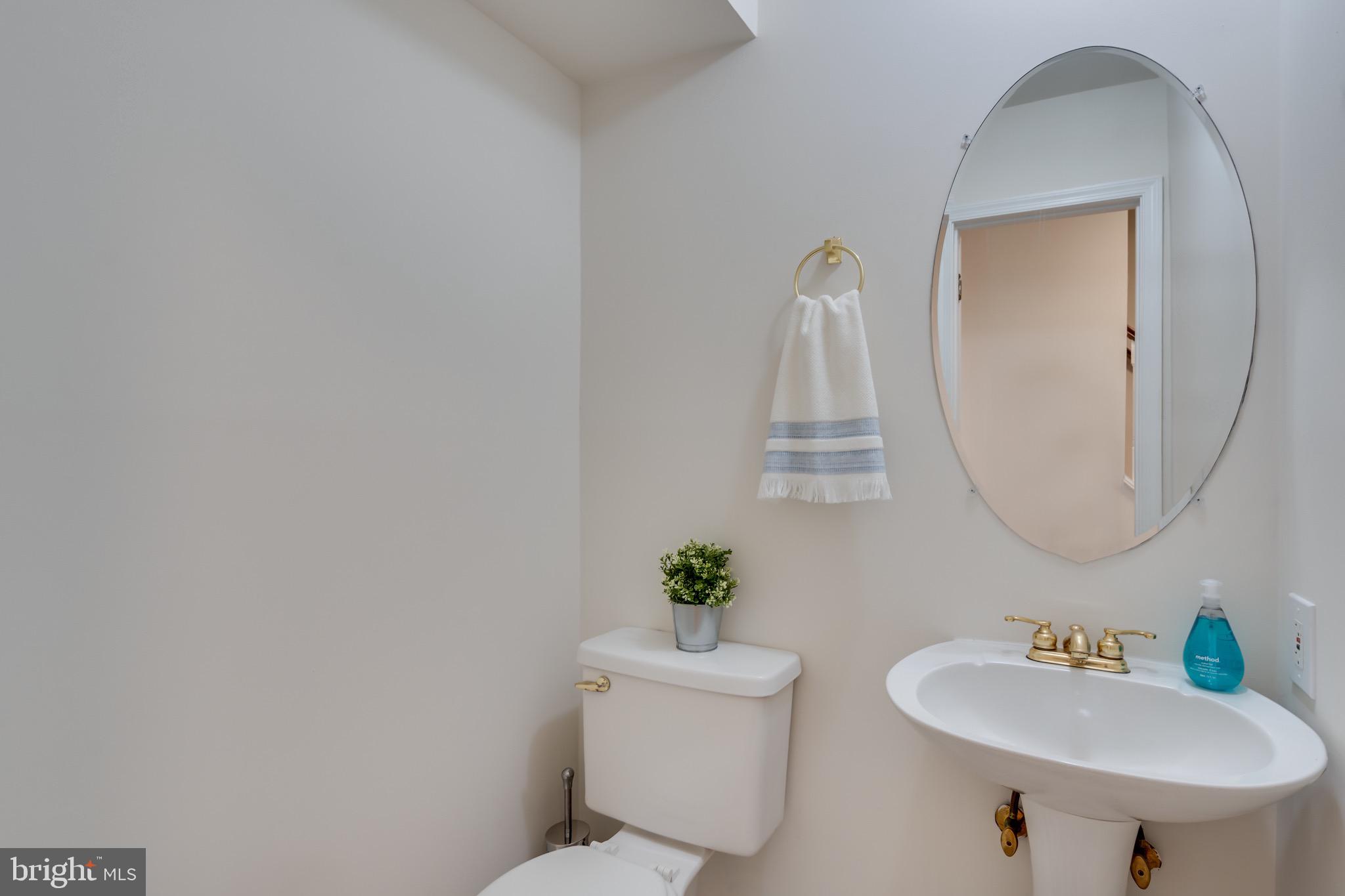 6490 Franconia Road Springfield, VA 22150 - Photo 29 of 34 a bathroom with a sink and a mirror