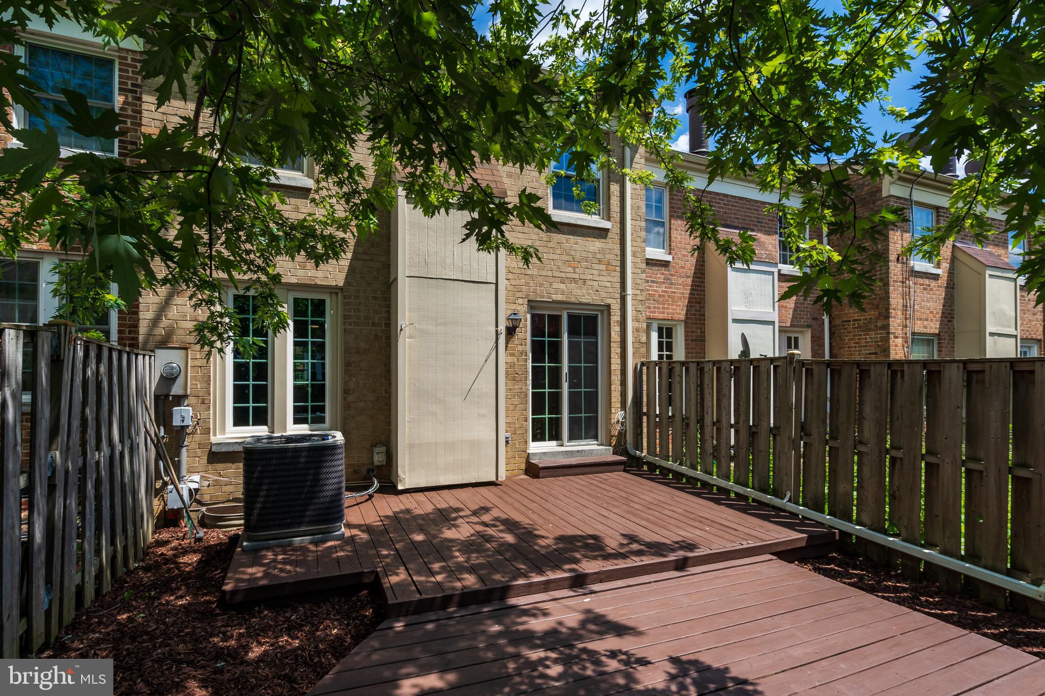 6490 Franconia Road Springfield, VA 22150 - Photo 32 of 34 a front view of a house with a backyard