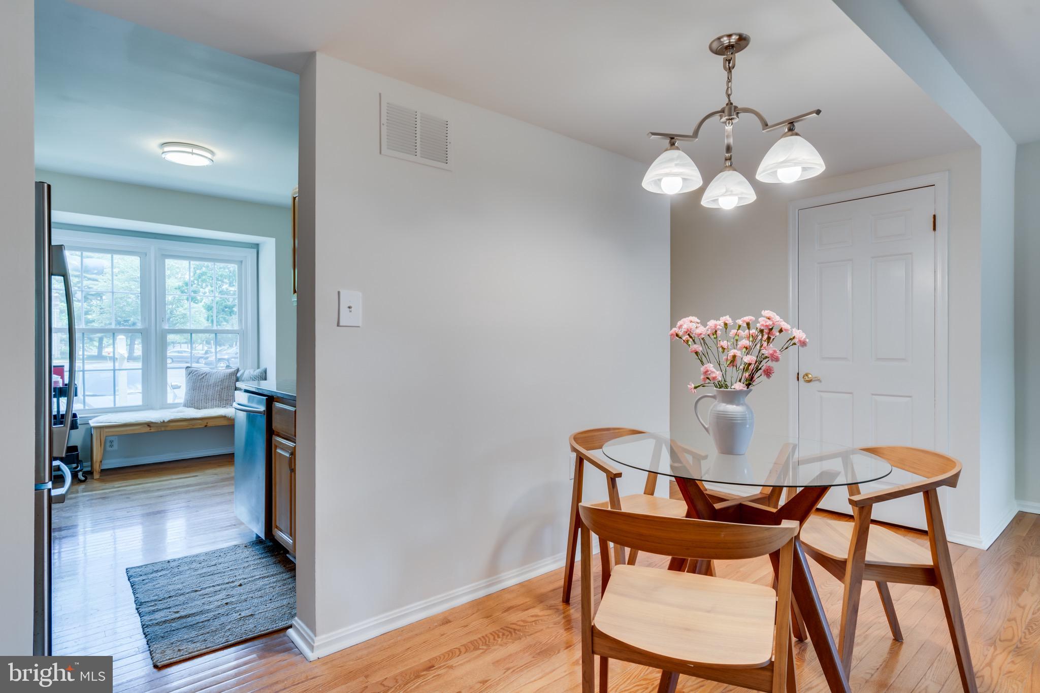 6490 Franconia Road Springfield, VA 22150 - Photo 8 of 34 a view of a dining room with furniture and chandelier