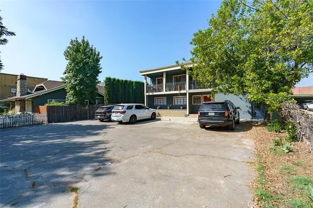 a car parked in front of a house