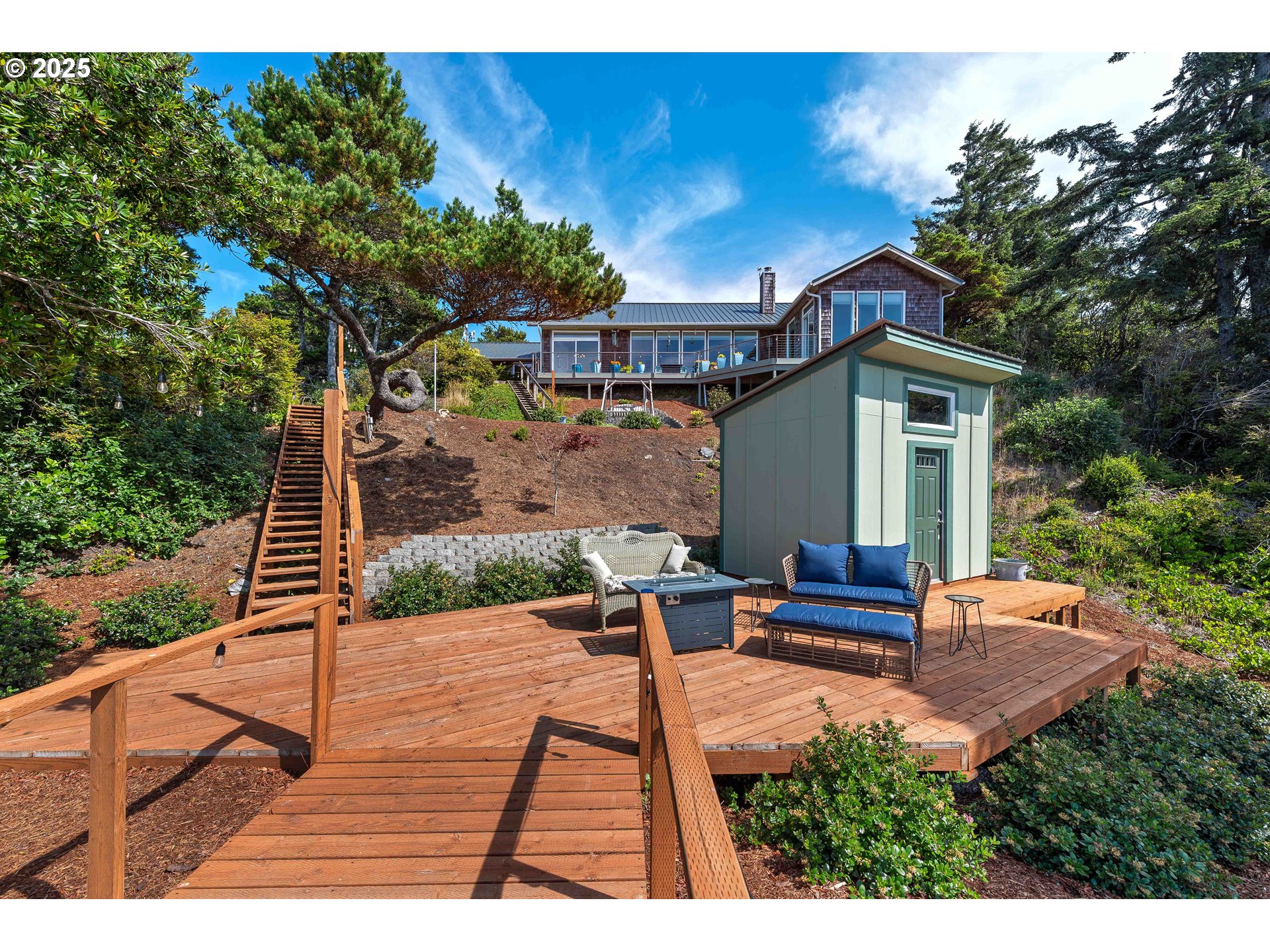 53 Shoreline Drive Florence, OR 97439 - Photo 28 of 36 a view of a backyard with sitting area