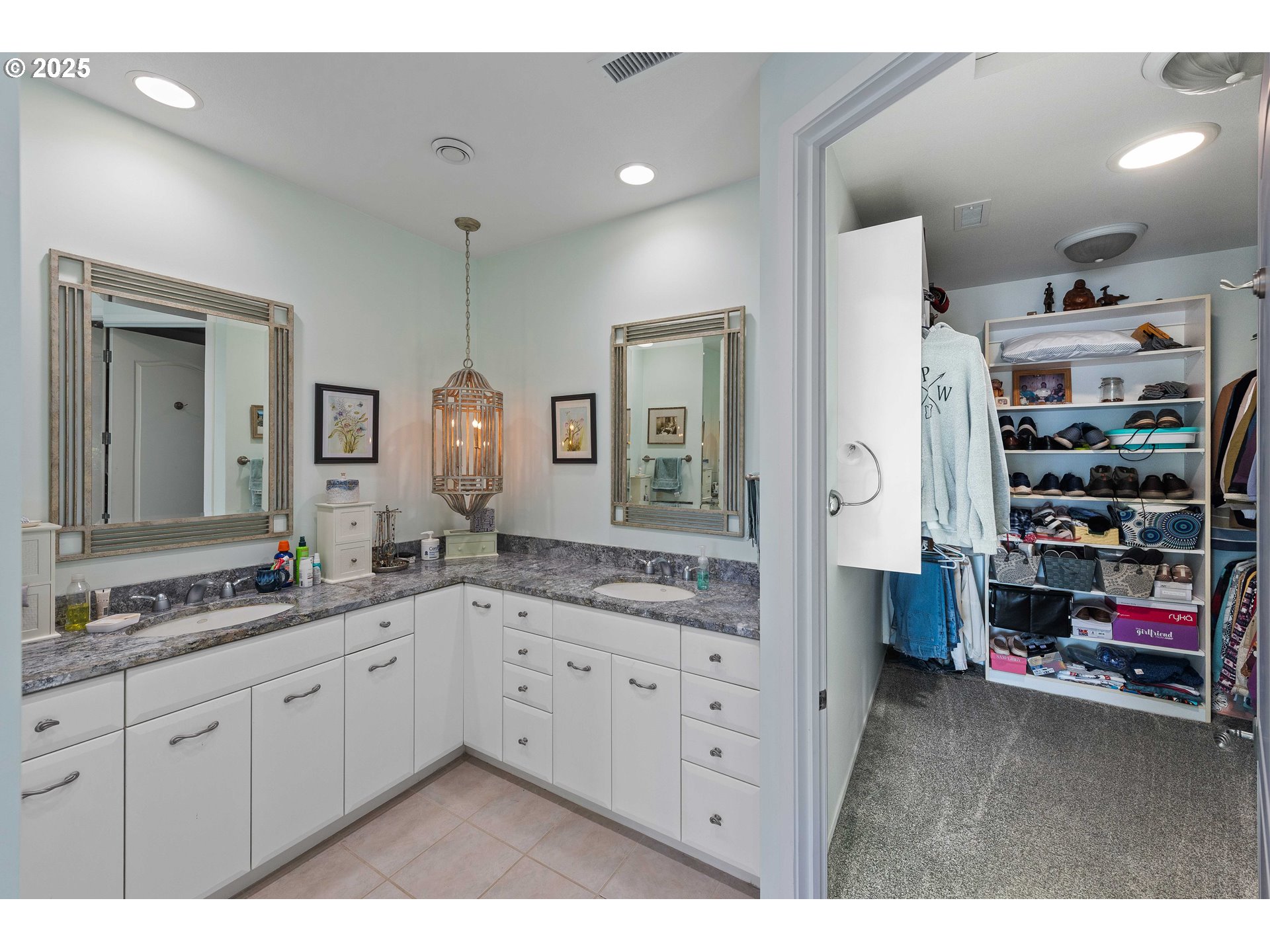 53 Shoreline Drive Florence, OR 97439 - Photo 7 of 36 a spacious bathroom with a double vanity sink and a mirror