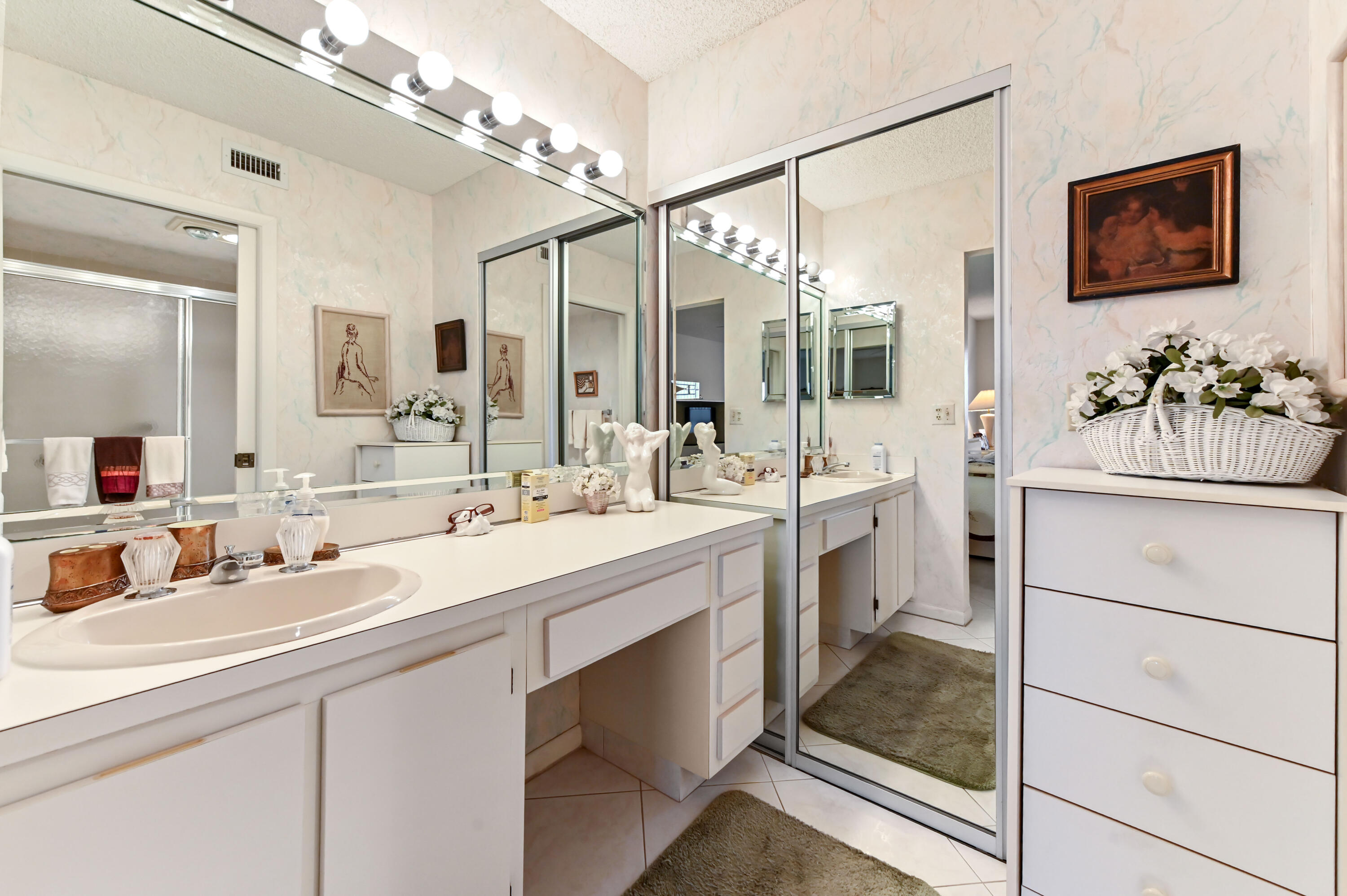 15074 Witney Road, Unit 107 Delray Beach, FL 33484 - Photo 21 of 60 a bathroom with a double vanity sink mirror and double