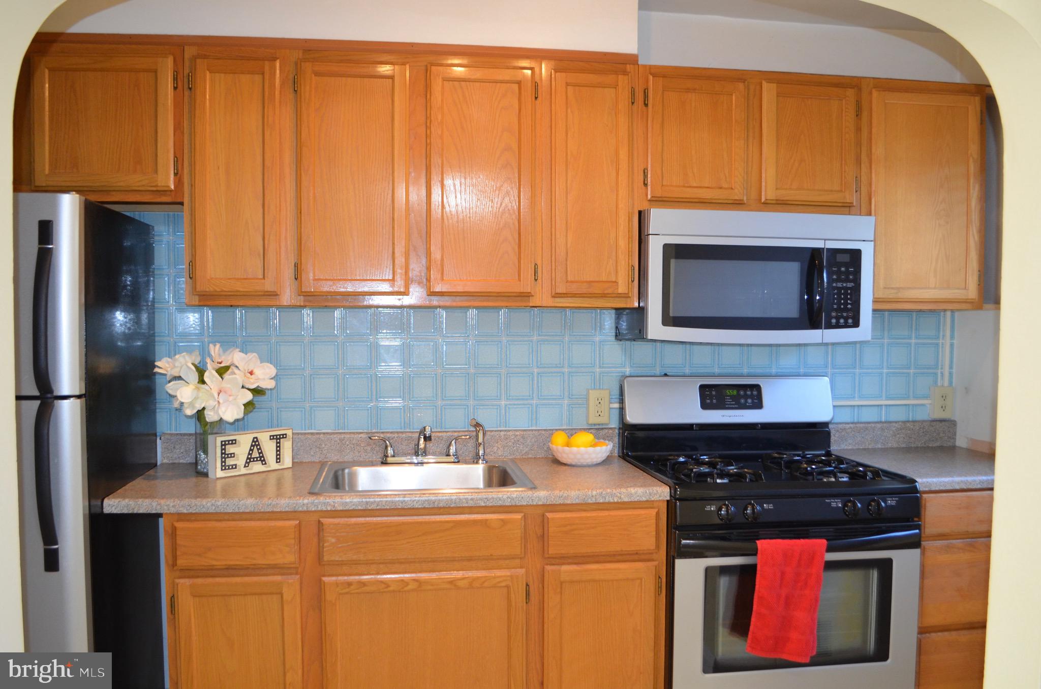 503 Sunset Road Baltimore, MD 21223 - Photo 12 of 21 Stainless appliances in the updated kitchen!