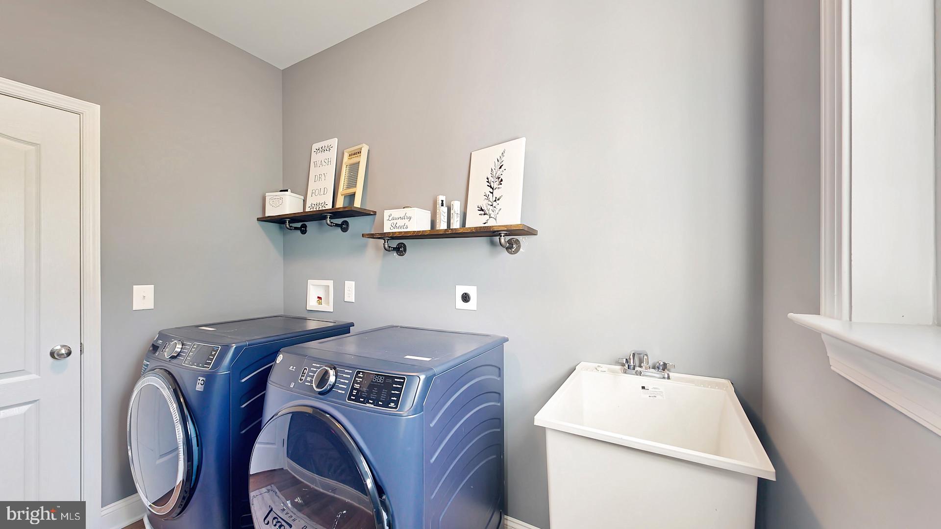 2 Waterview Road Lewes, DE 19958 - Photo 10 of 17 a utility room with dryer and washer