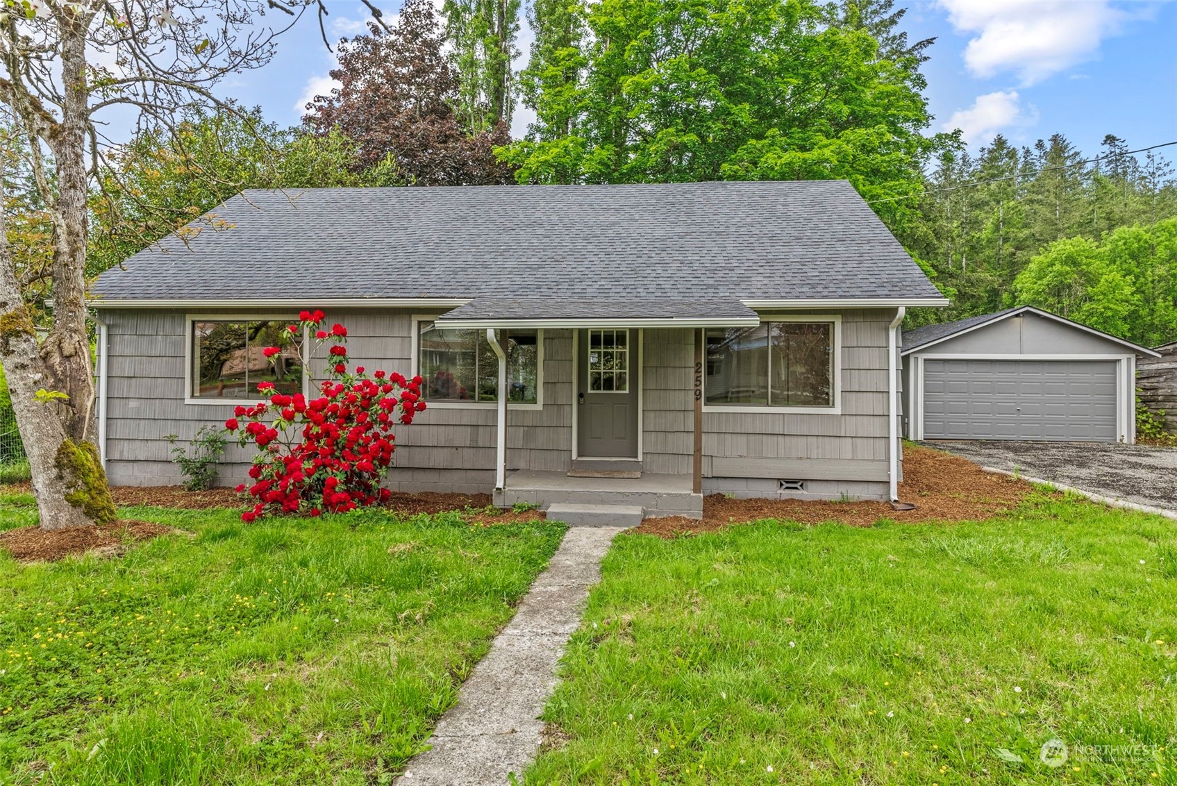 259 Stowell Road Salkum, WA 98582 - Photo 1 of 19 a front view of house with yard and green space