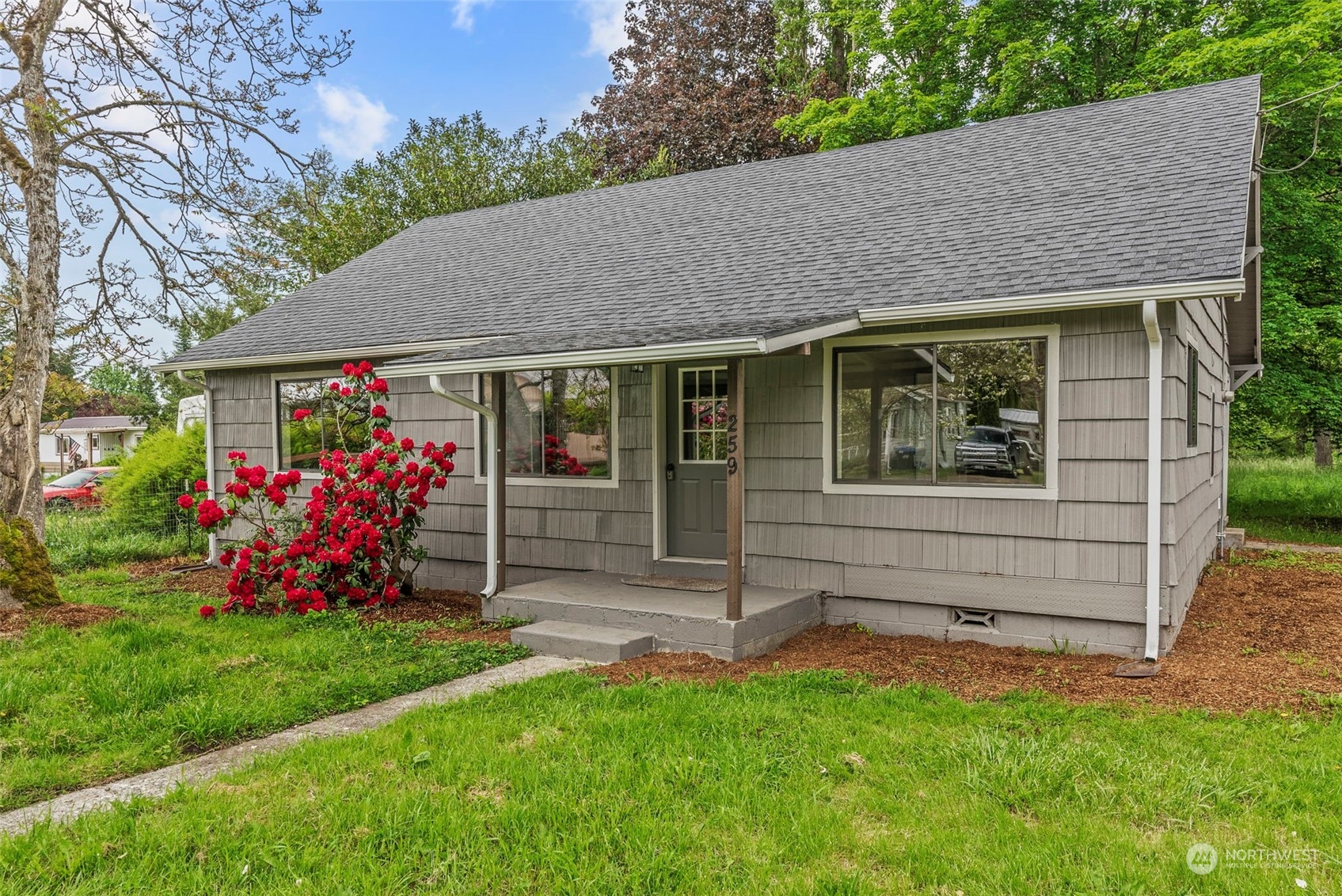 259 Stowell Road Salkum, WA 98582 - Photo 2 of 19 a view of front of house with a yard