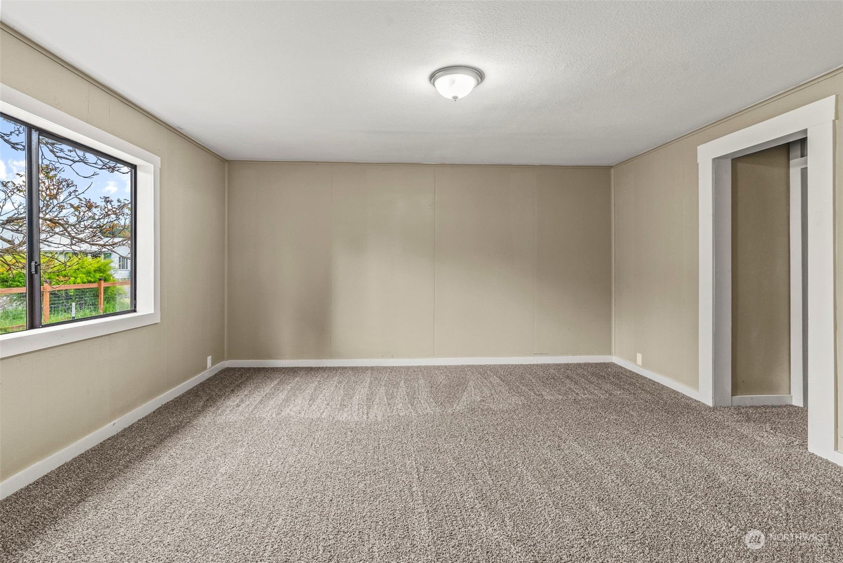 259 Stowell Road Salkum, WA 98582 - Photo 5 of 19 a view of an empty room with a window