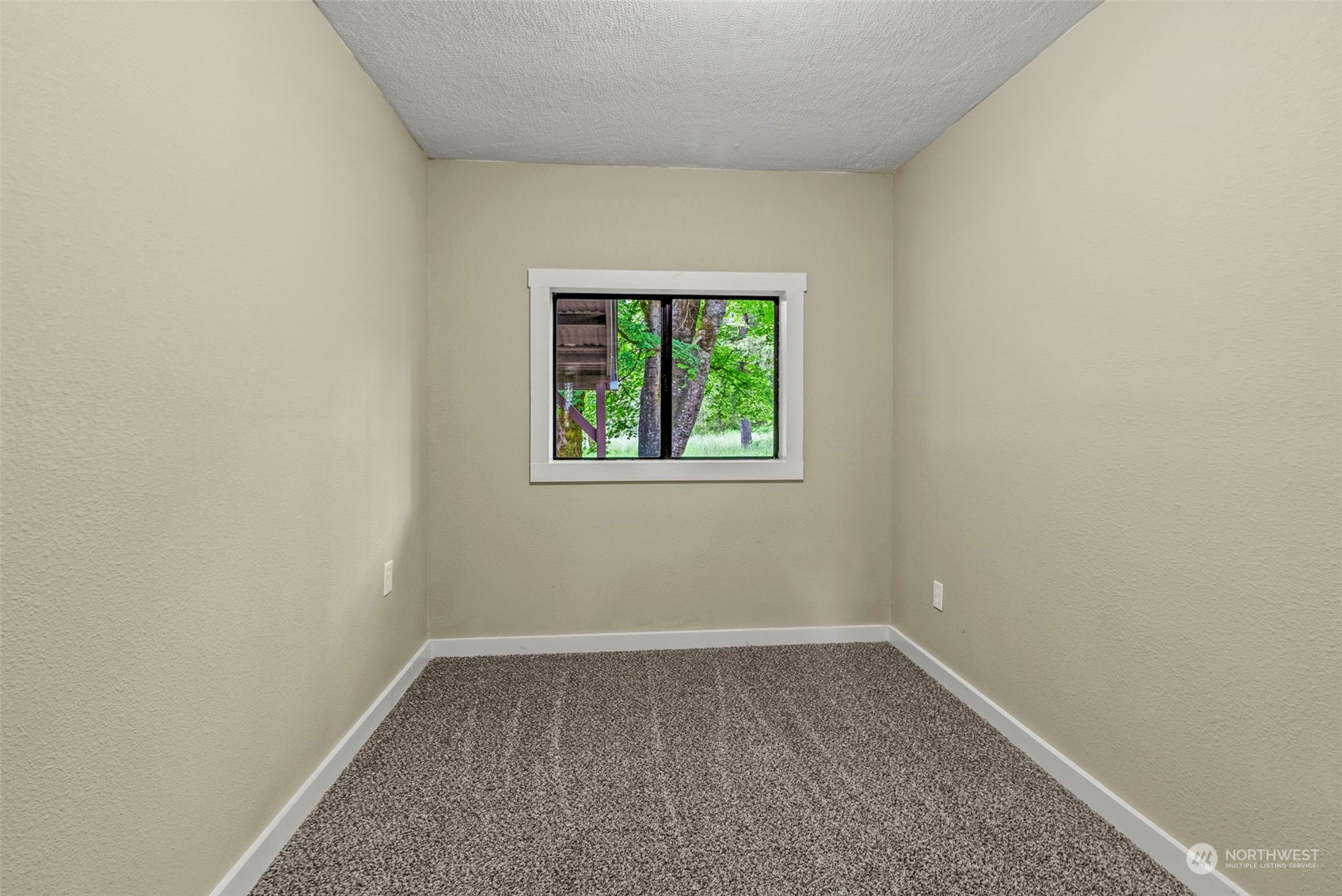 259 Stowell Road Salkum, WA 98582 - Photo 10 of 19 an empty room with a window