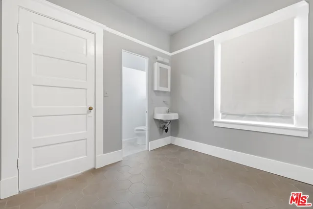 a bathroom with a sink and bathtub