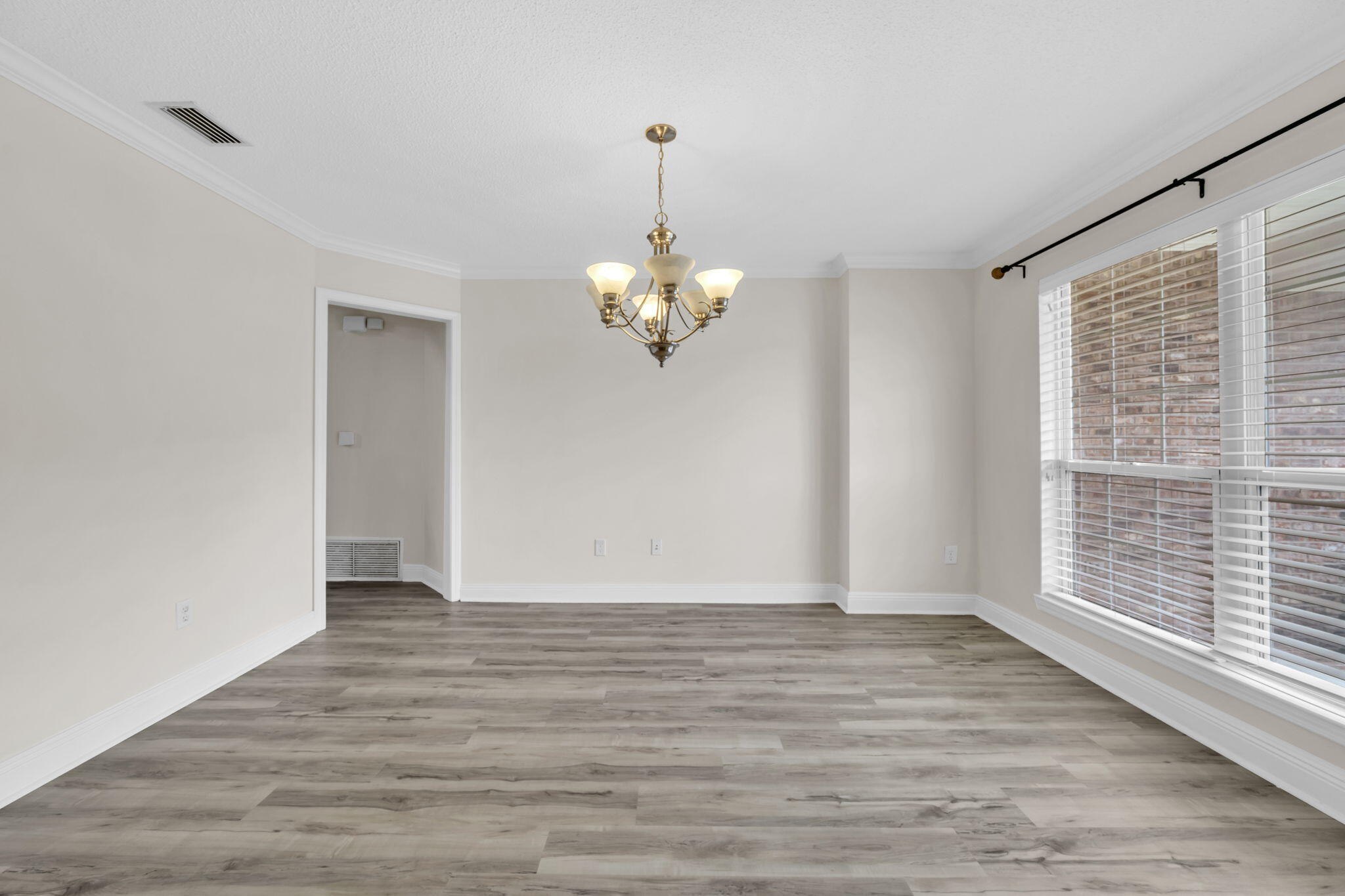 202 Gracie Lane Niceville, FL 32578 - Photo 10 of 47 a view of a livingroom with wooden floor
