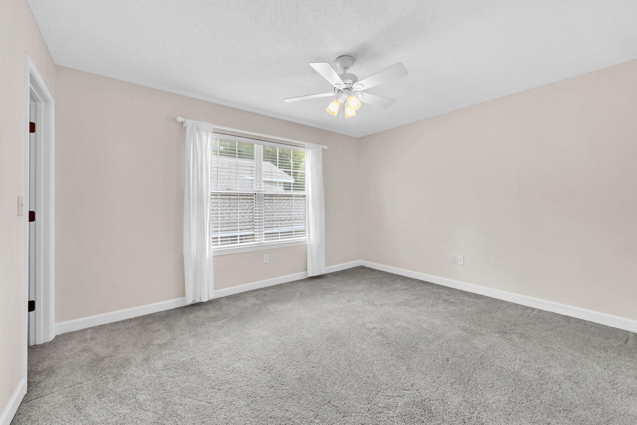 202 Gracie Lane Niceville, FL 32578 - Photo 38 of 47 a view of an empty room with a window