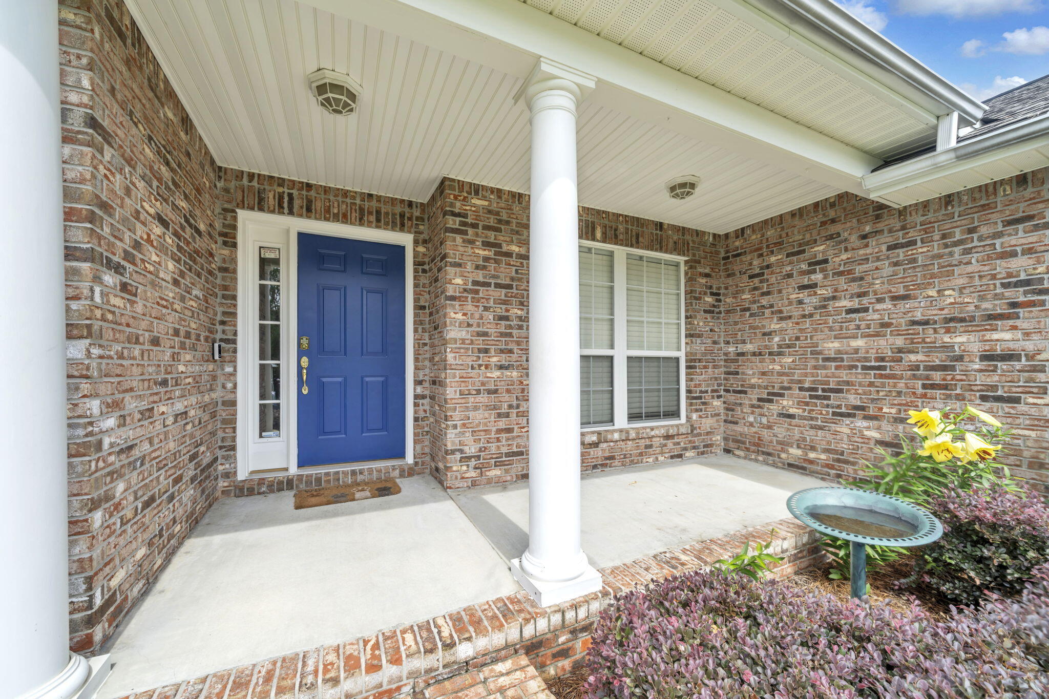 202 Gracie Lane Niceville, FL 32578 - Photo 5 of 47 a front view of a house with a yard