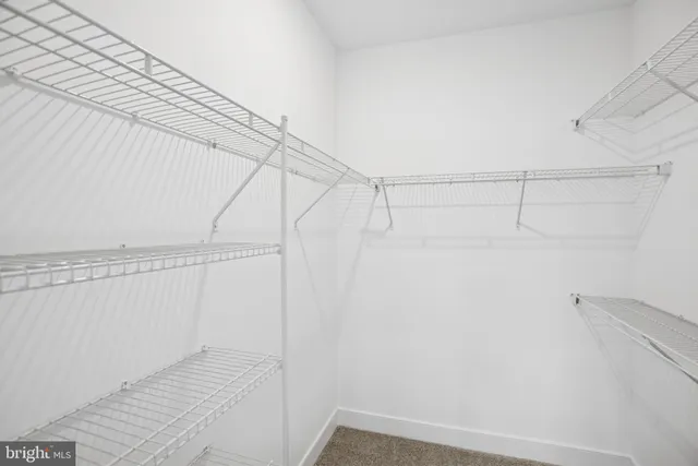 a front view of a building with a outdoor space