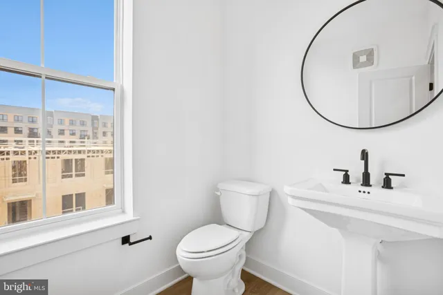 a bathroom with a sink a toilet and a bathtub