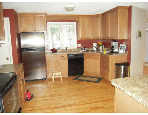 53 Stagecoach Road Amherst, MA 01002 - Photo 8 of 18 a kitchen with stainless steel appliances granite countertop a refrigerator a stove and a sink