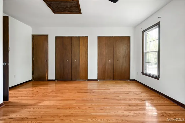 an empty room with windows