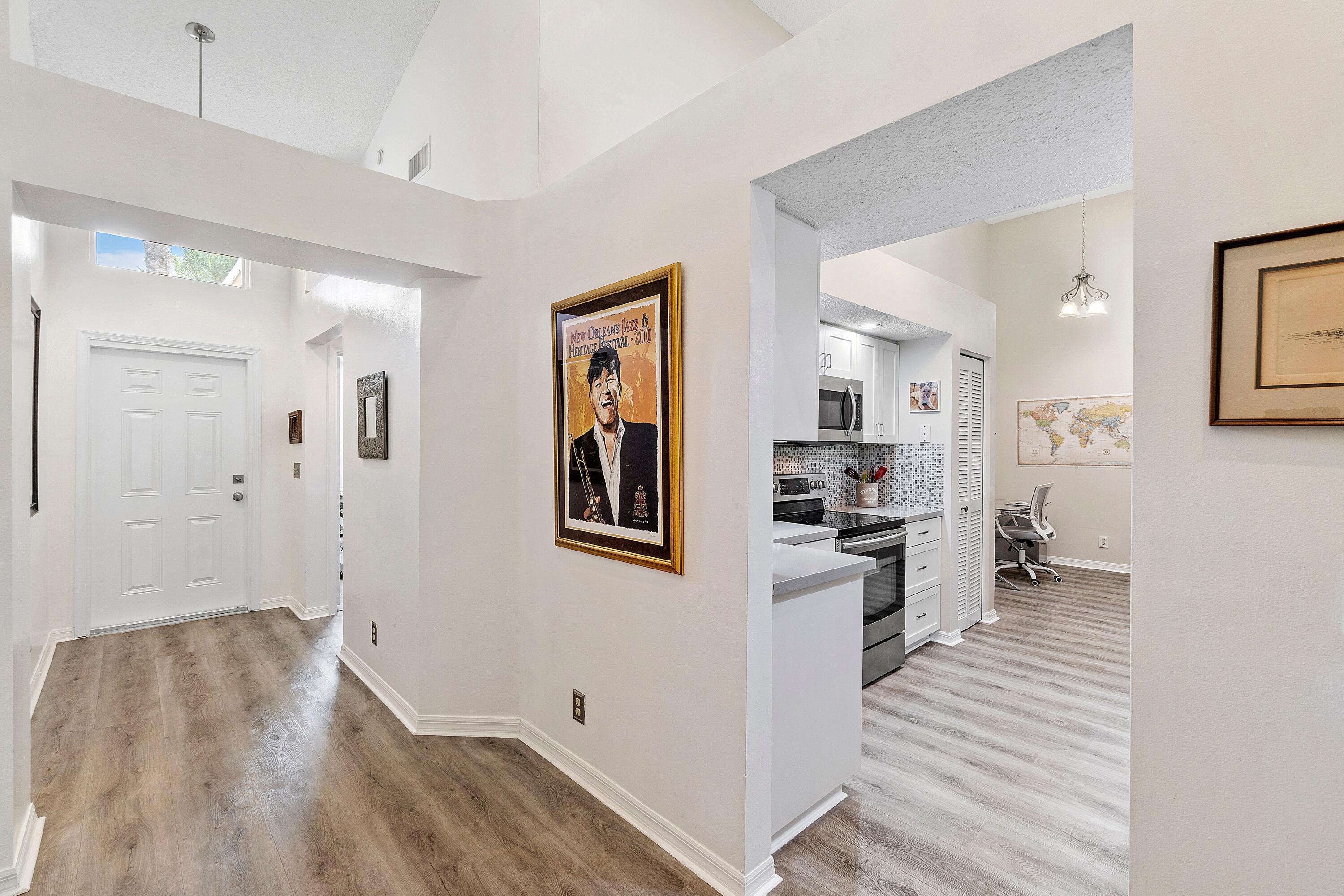 11143 Autoro Court Boca Raton, FL 33498 - Photo 11 of 35 11143 Kitchen and entryway
