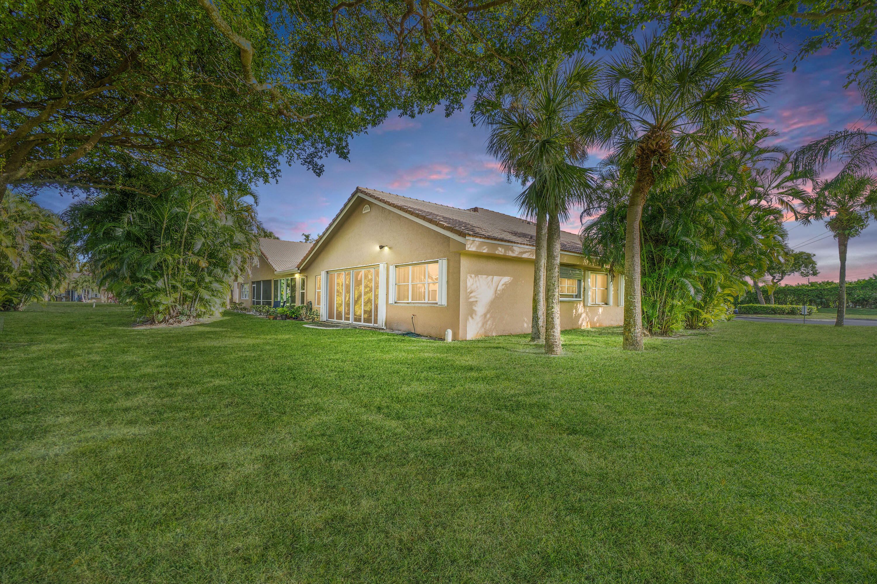 11143 Autoro Court Boca Raton, FL 33498 - Photo 29 of 35 exterior at dusk 11143