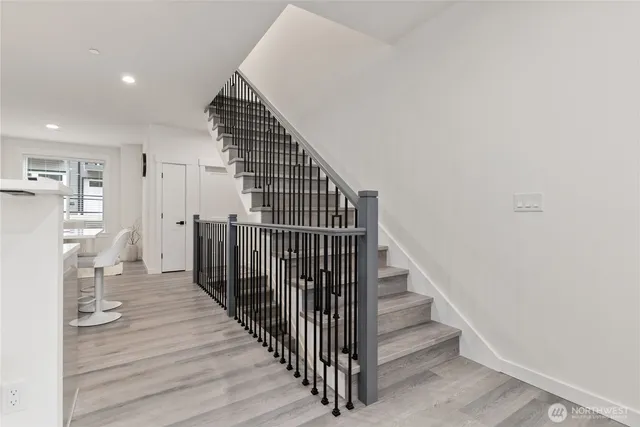 a view of a balcony with a tree