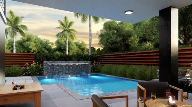 a view of a chairs and table in the patio