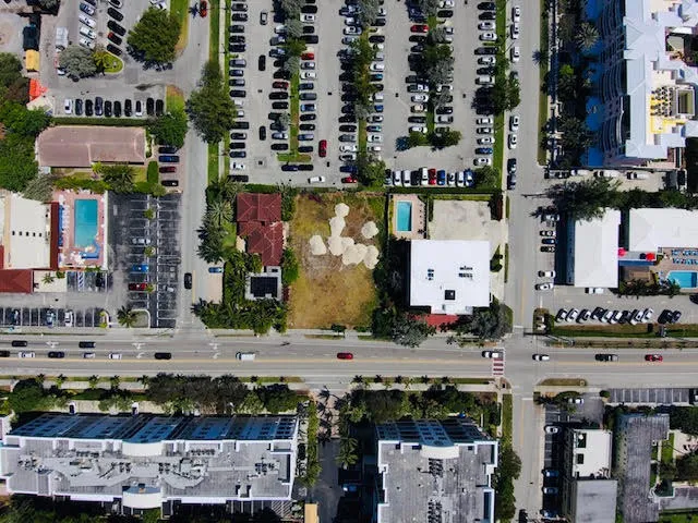 a view of city with the shops and fruits market