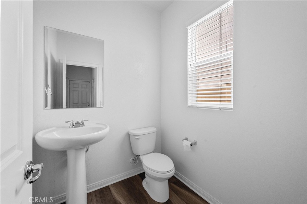 893 Harvest Avenue Upland, CA 91786 - Photo 11 of 40 a bathroom with a sink toilet and a mirror