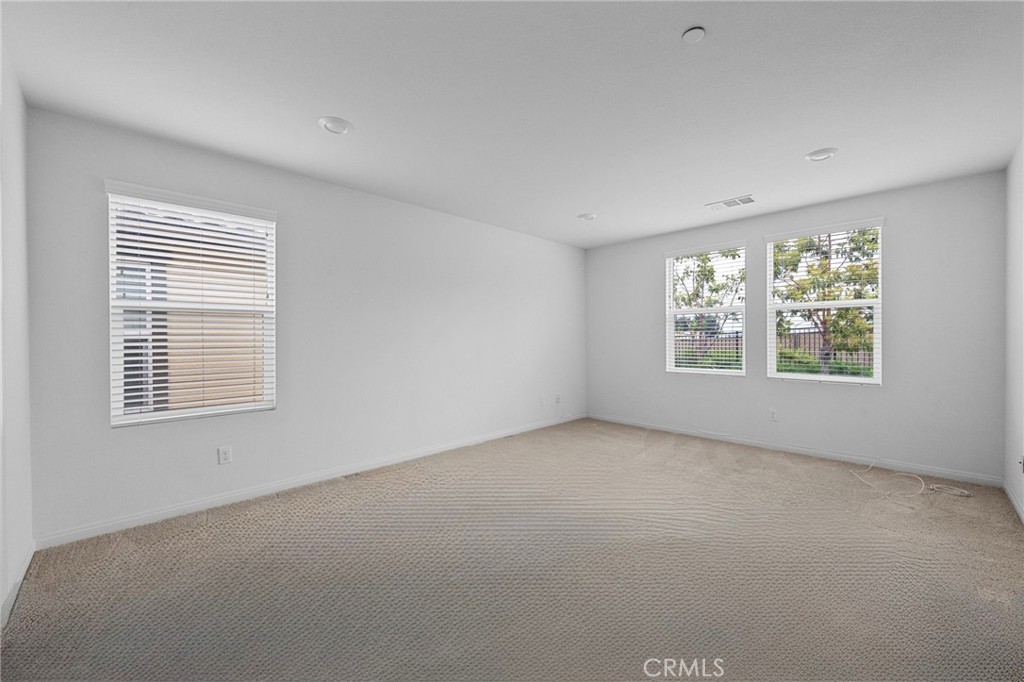 893 Harvest Avenue Upland, CA 91786 - Photo 14 of 40 an empty room with windows