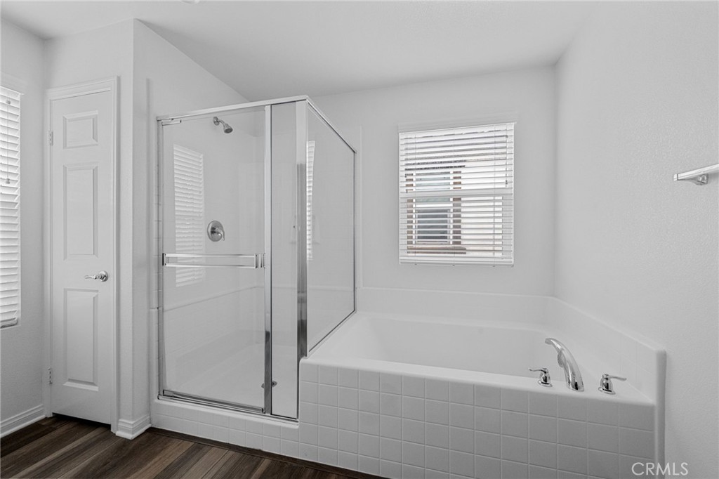 893 Harvest Avenue Upland, CA 91786 - Photo 20 of 40 a bathroom with a bathtub and a shower