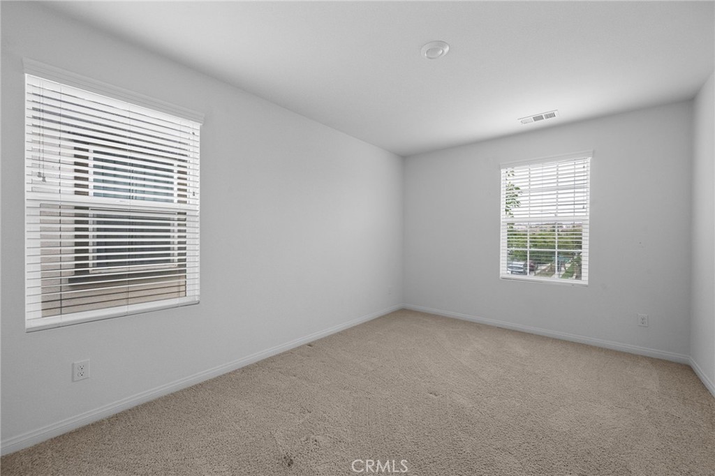 893 Harvest Avenue Upland, CA 91786 - Photo 21 of 40 a view of an empty room with a window