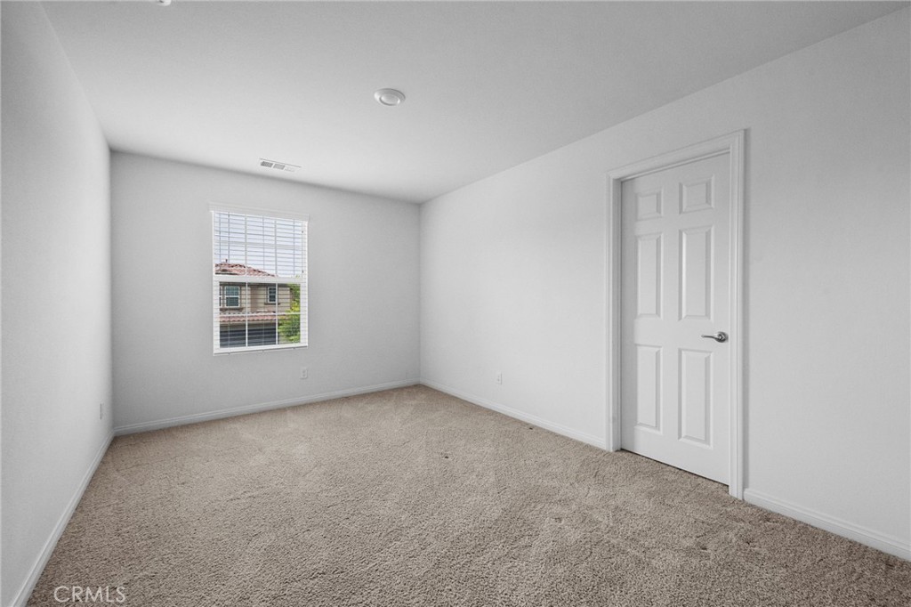 893 Harvest Avenue Upland, CA 91786 - Photo 26 of 40 a view of an empty room with a window