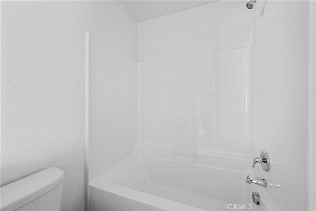 893 Harvest Avenue Upland, CA 91786 - Photo 28 of 40 a bathroom with a bathtub