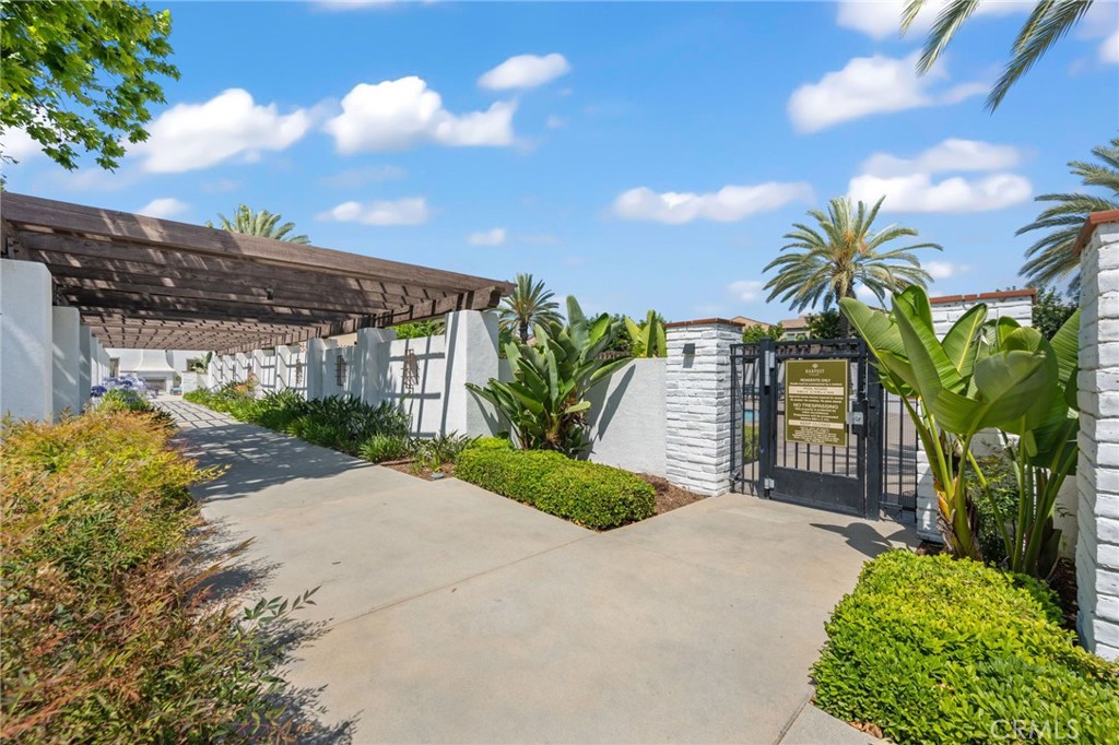 893 Harvest Avenue Upland, CA 91786 - Photo 38 of 40 a view of a palm plant in front of a building