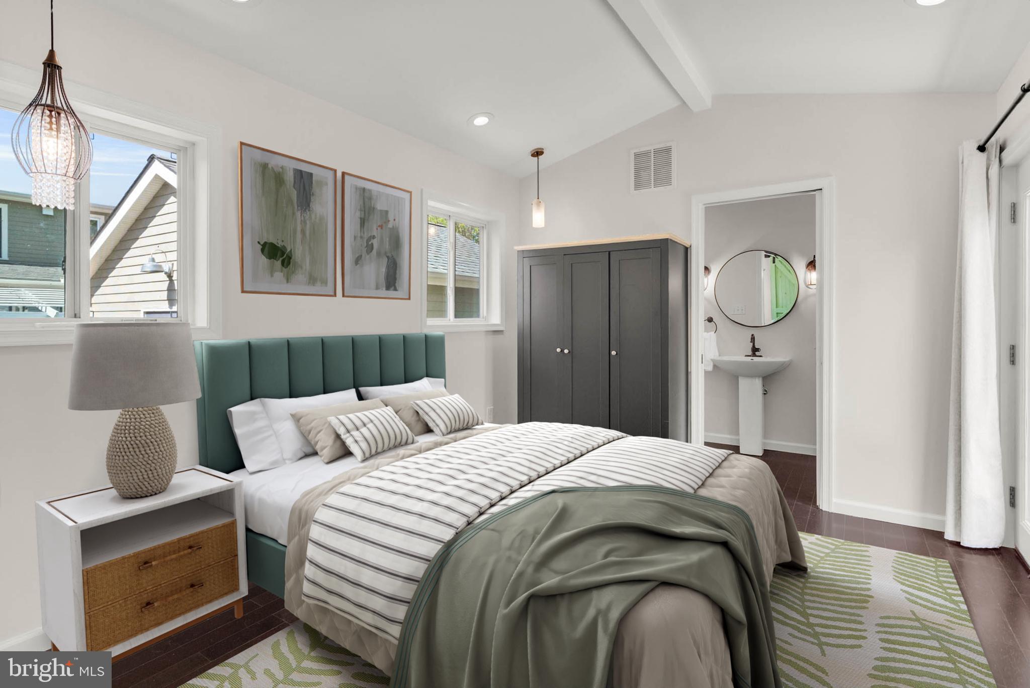 1502 Grange Road Edgewater, MD 21037 - Photo 16 of 43 a bedroom with a bed and a window