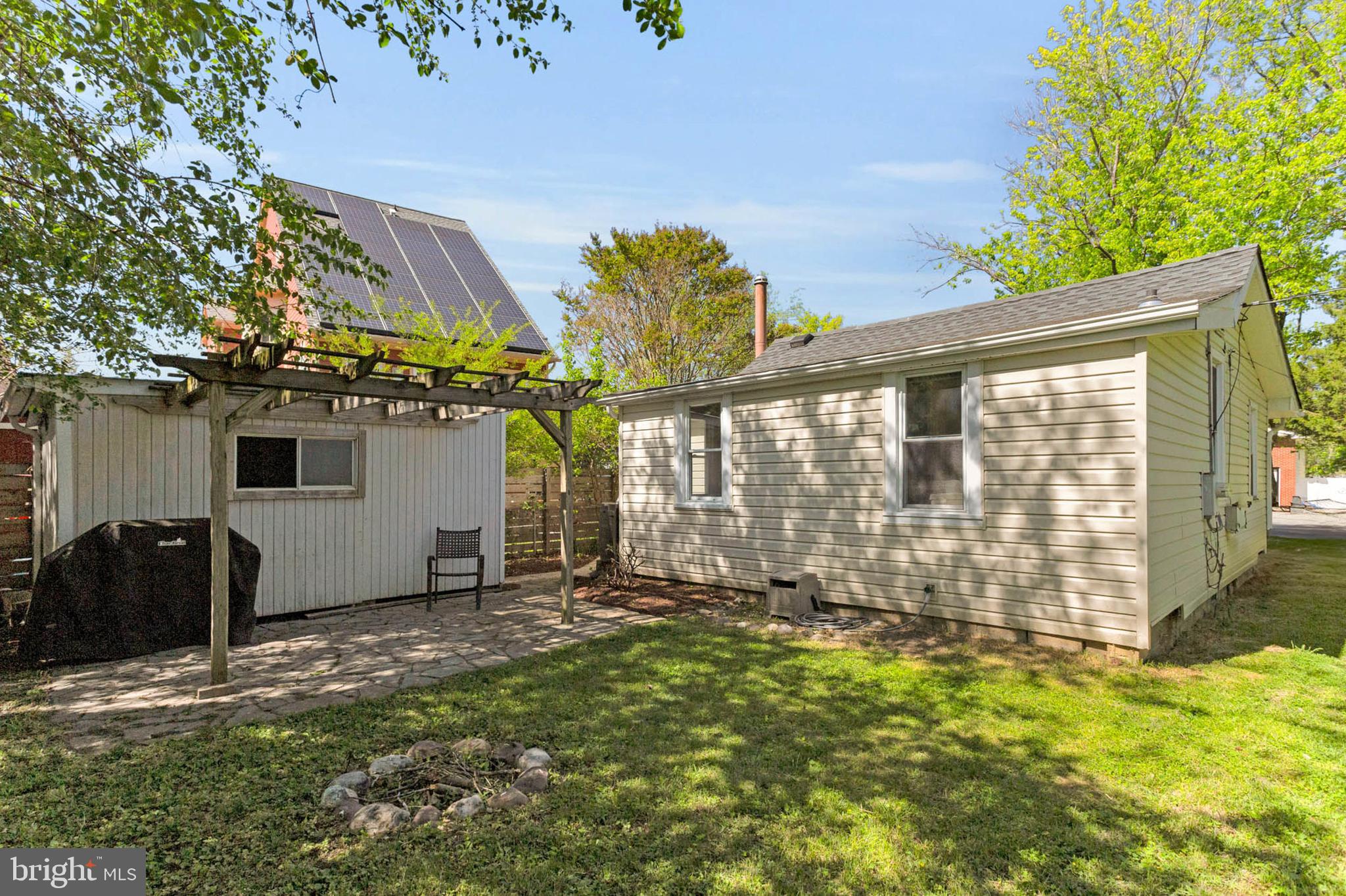 1502 Grange Road Edgewater, MD 21037 - Photo 27 of 43 a view of a house with backyard and sitting area