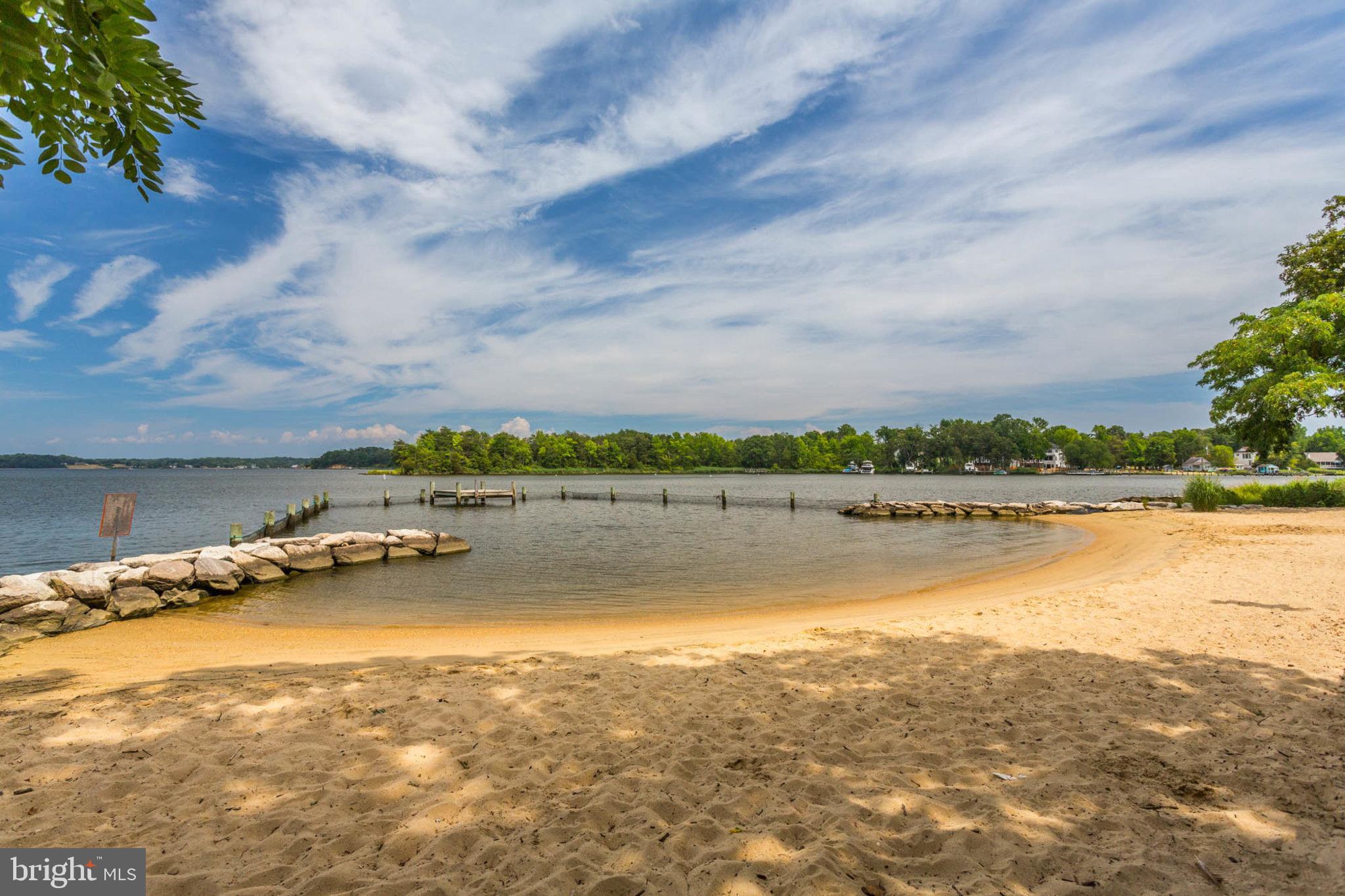 1502 Grange Road Edgewater, MD 21037 - Photo 39 of 43 a view of a lake with a yard