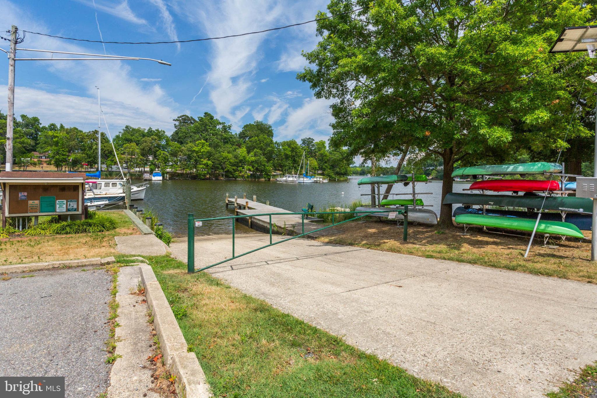 1502 Grange Road Edgewater, MD 21037 - Photo 41 of 43 a view of a lake with large trees