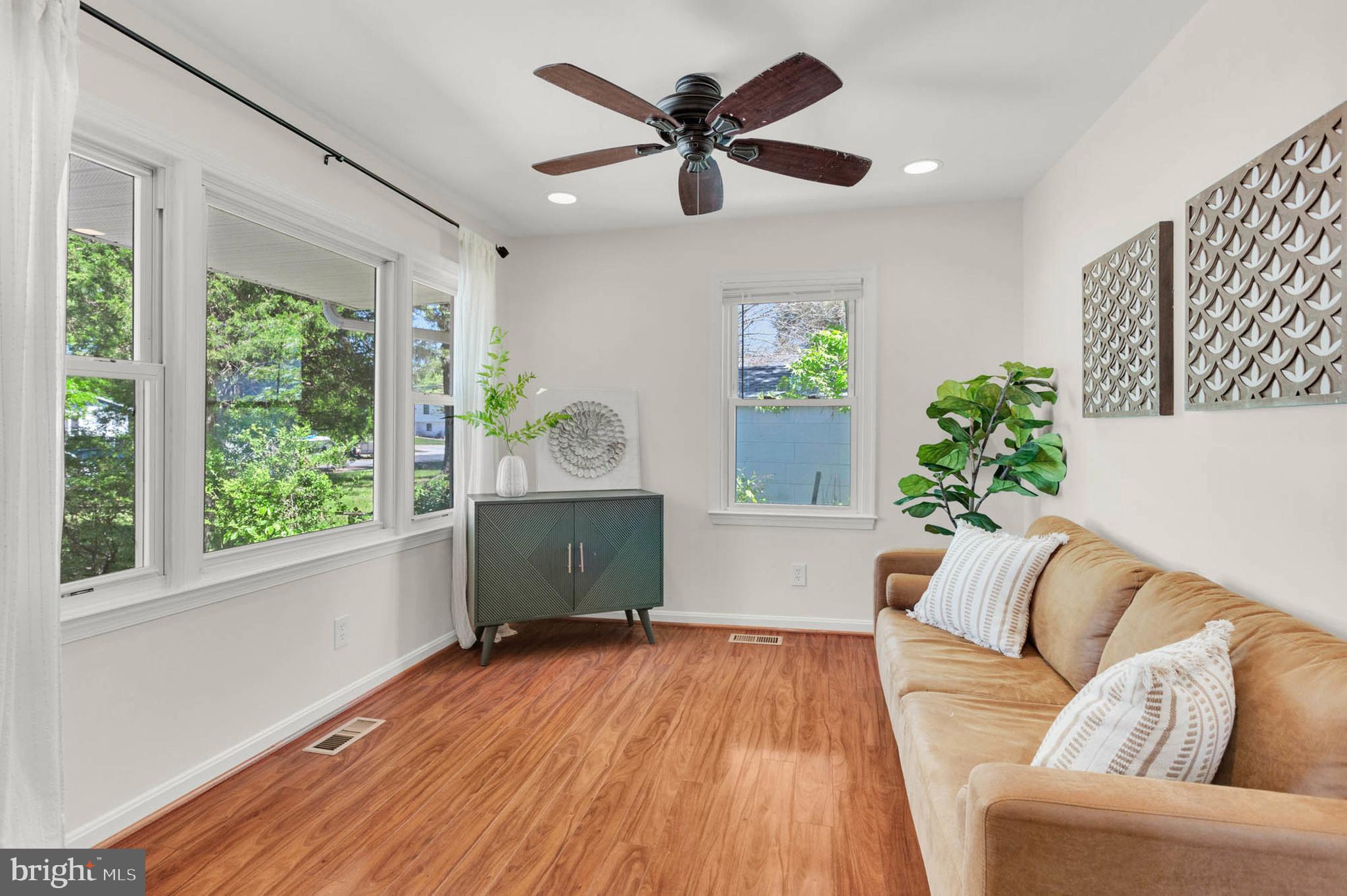 1502 Grange Road Edgewater, MD 21037 - Photo 5 of 43 a living room with furniture and a large window