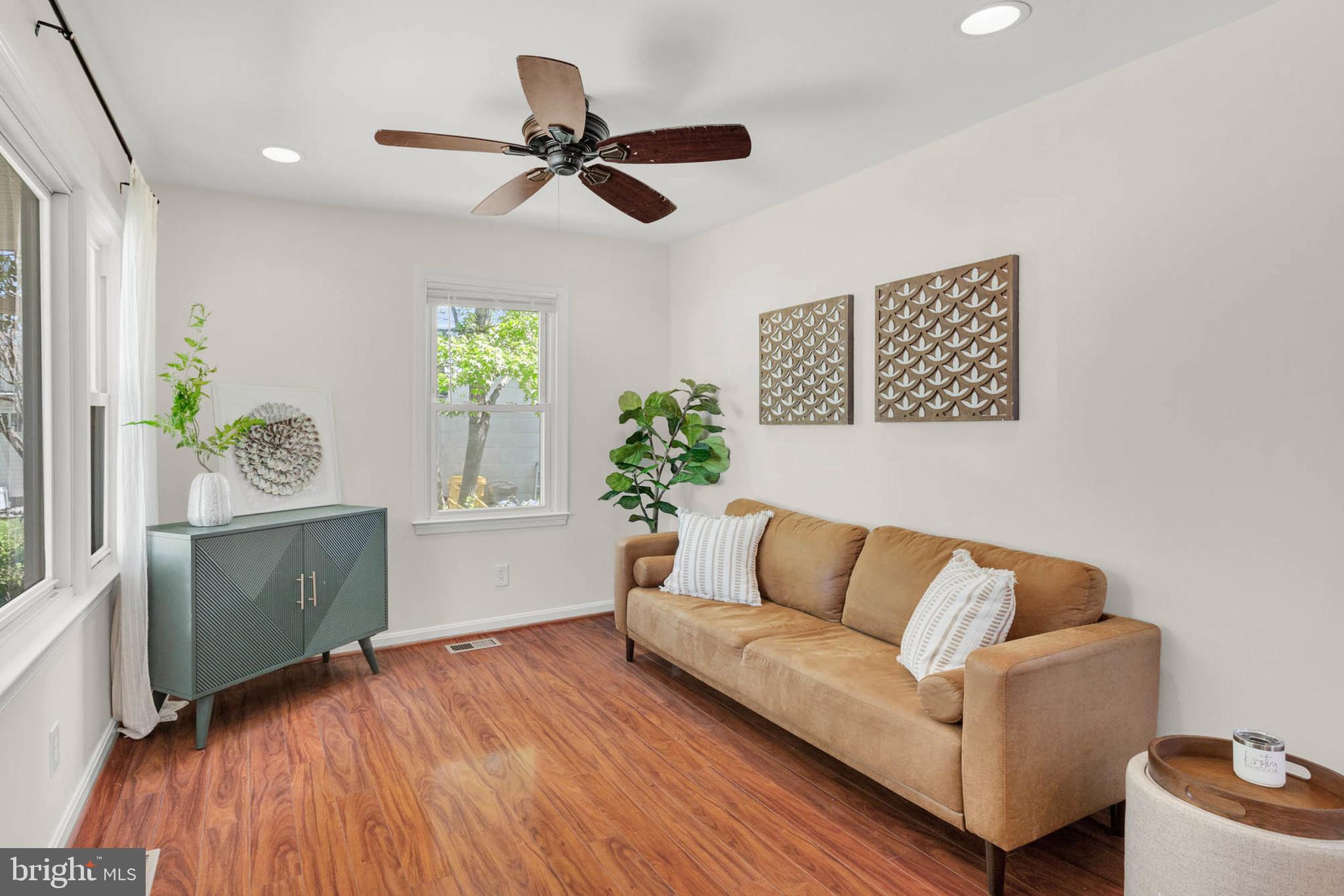 1502 Grange Road Edgewater, MD 21037 - Photo 6 of 43 a living room with furniture and a wooden floor