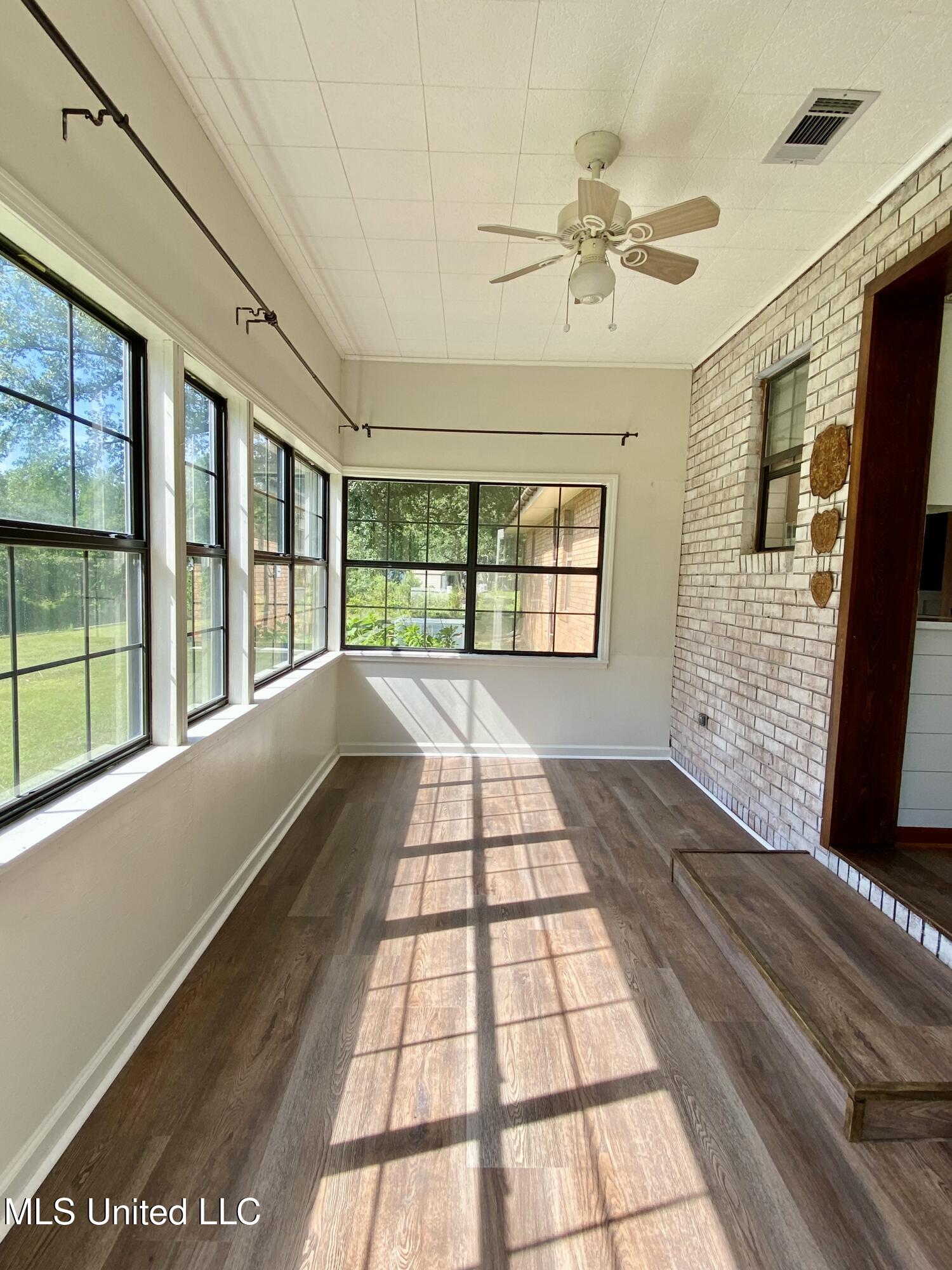 104 Baucum Road Carriere, MS 39426 - Photo 34 of 68 34, Sunroom, IMG_3608