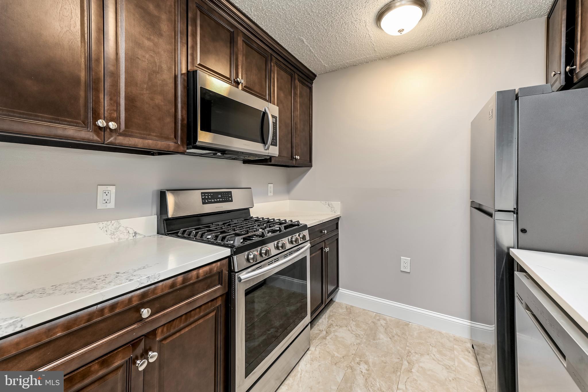 20991 Timber Ridge Terrace, Unit 204 Ashburn, VA 20147 - Photo 12 of 27 Gas Stove and Oven