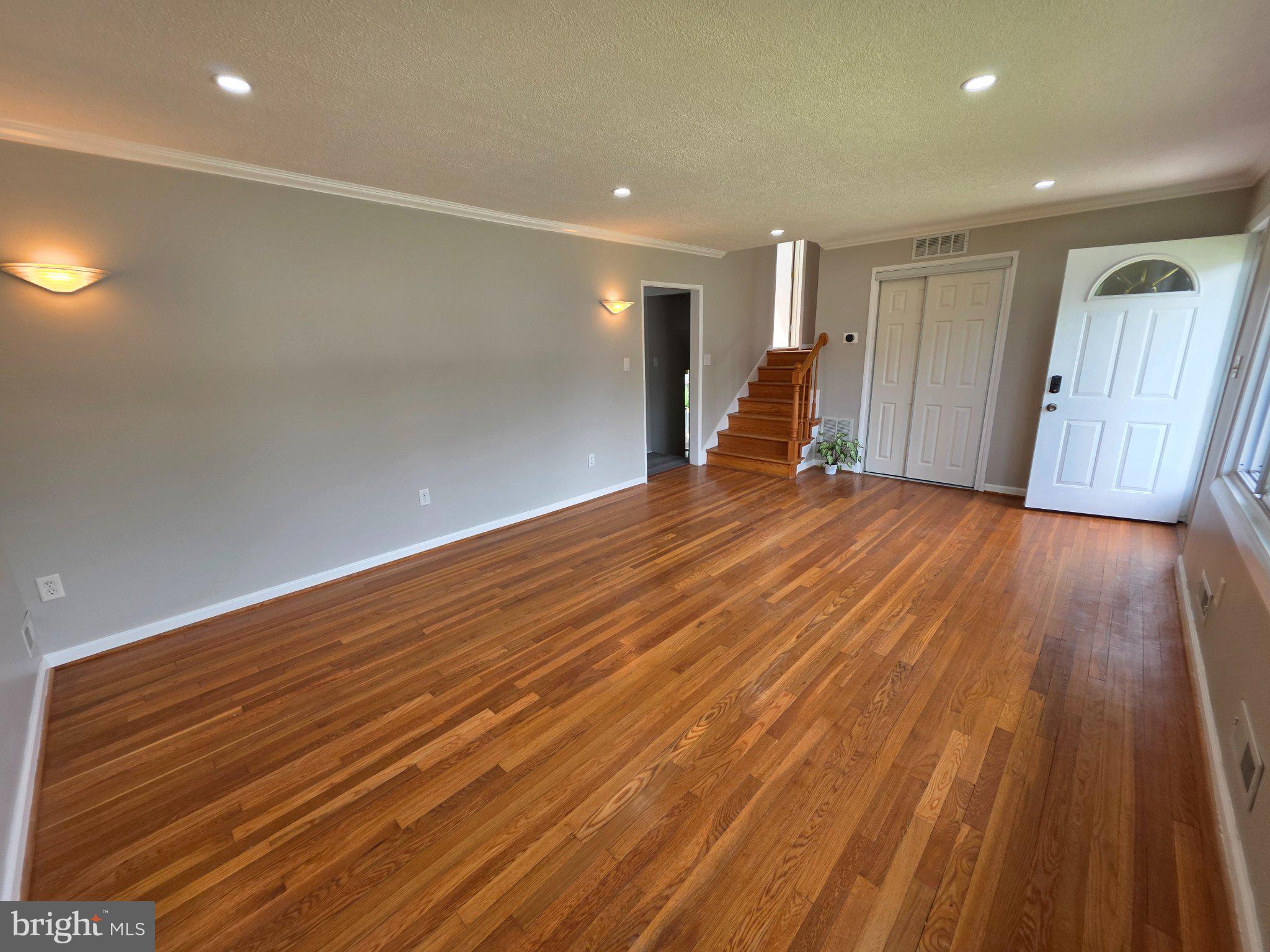 5915 Charnwood Road Catonsville, MD 21228 - Photo 3 of 21 Spacious entryway with warm wood floors.