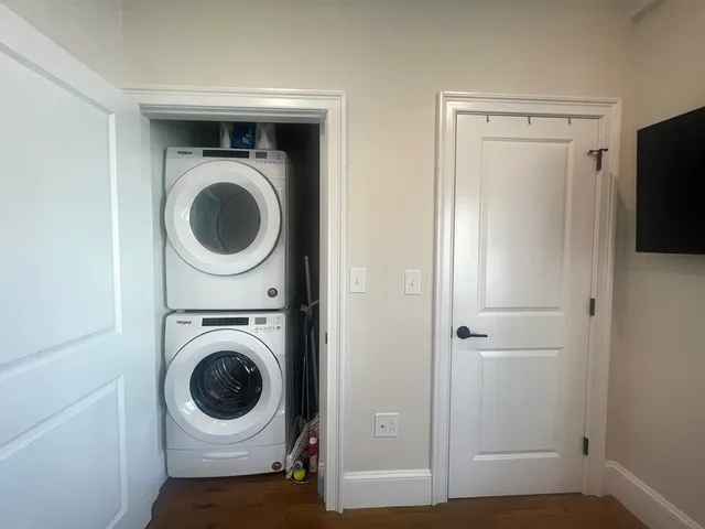 a view of a storage & utility room with washer and dryer
